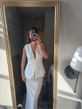Elegant White Deep-V Peplum Top
